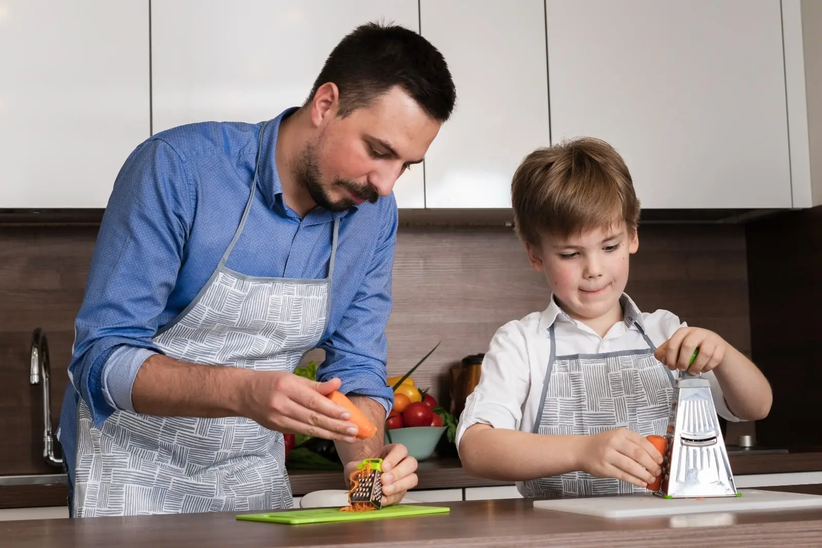 Father and kid cooking
