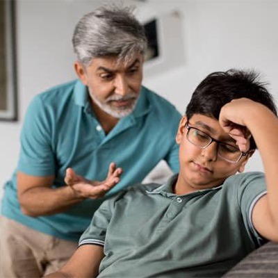 Dad shouting and scolding her kid